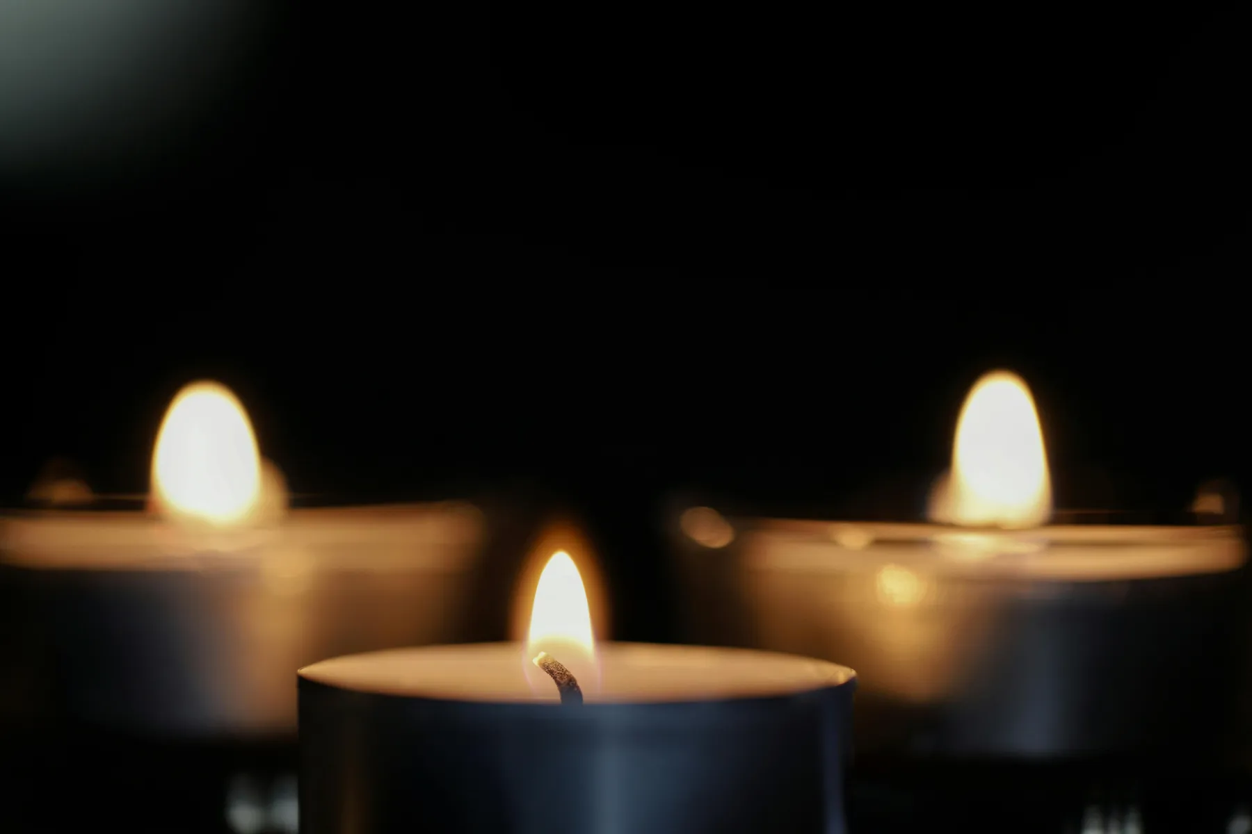 Memorial candles in a peaceful setting